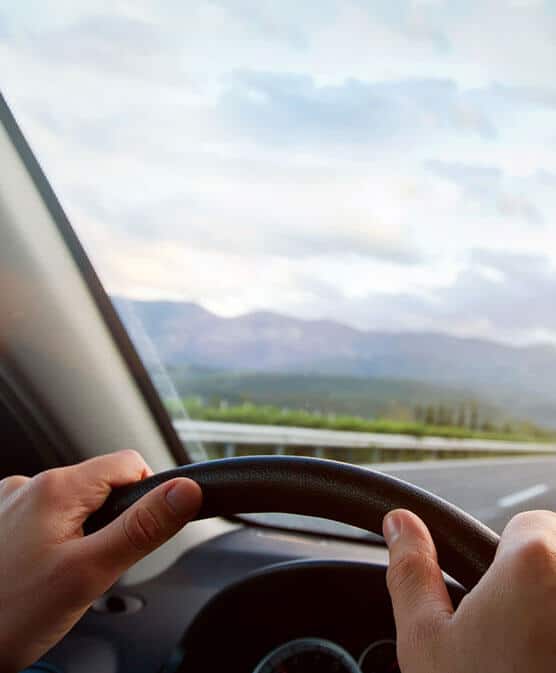 man driving car safely