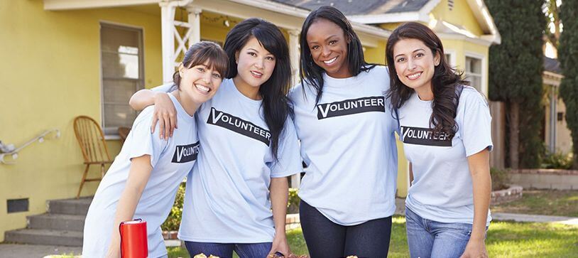 group of volunteers ready for background check